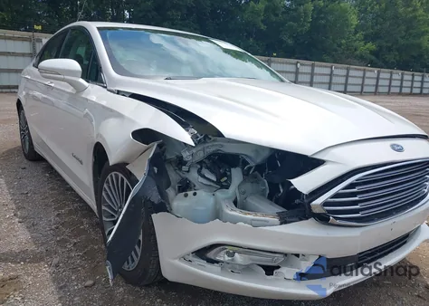 2017 Ford Fusion Hybrid Titanium z USA, uszkodzony, nr VIN 3FA6P0RU1HR203797
